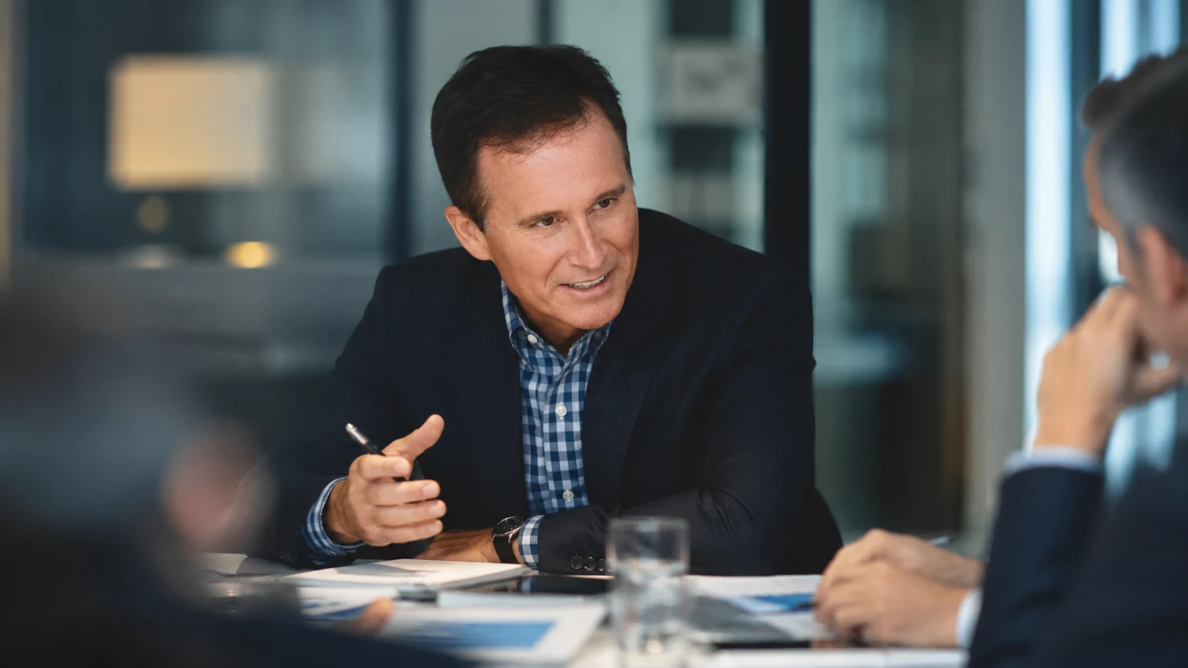 Consulting conversation around a conference table